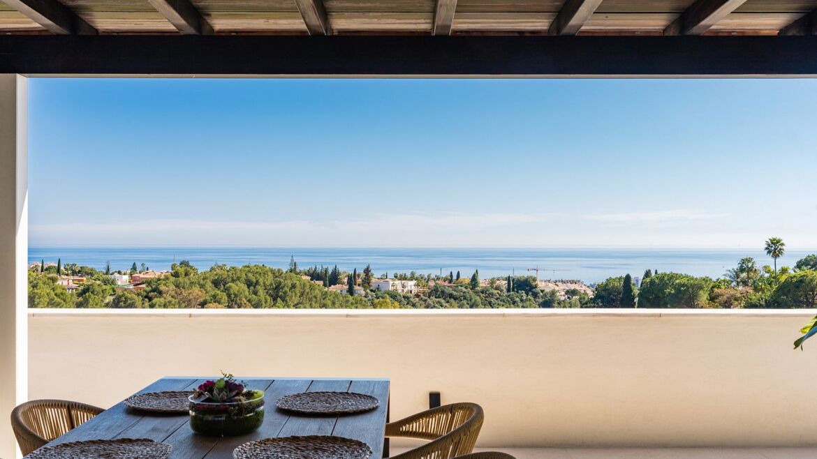 Covered penthouse terrace with sea views at Condado de Sierra Blanca