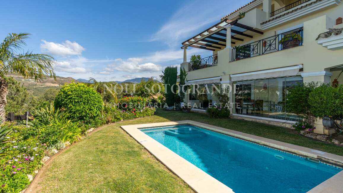 Corner garden apartment with private pool and partial sea views in Aloha Park