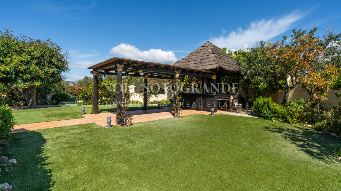 Corner garden apartment with private pool and partial sea views in Aloha Park