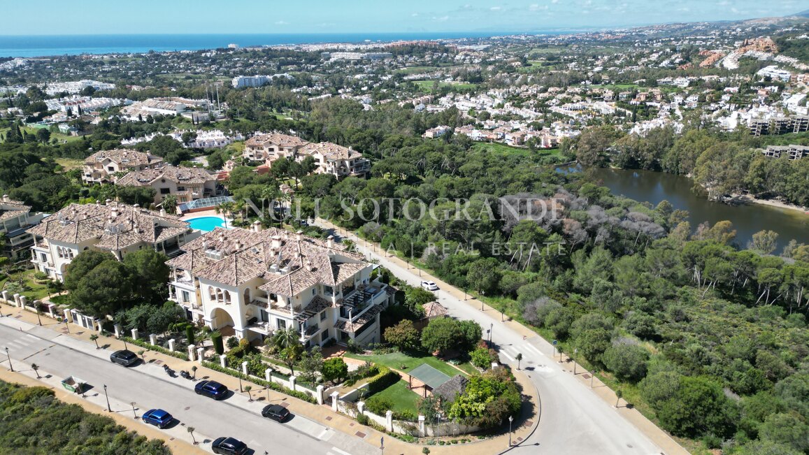 Corner garden apartment with private pool and partial sea views in Aloha Park