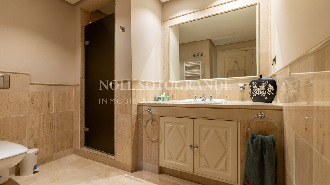 Corner garden apartment with private pool and partial sea views in Aloha Park