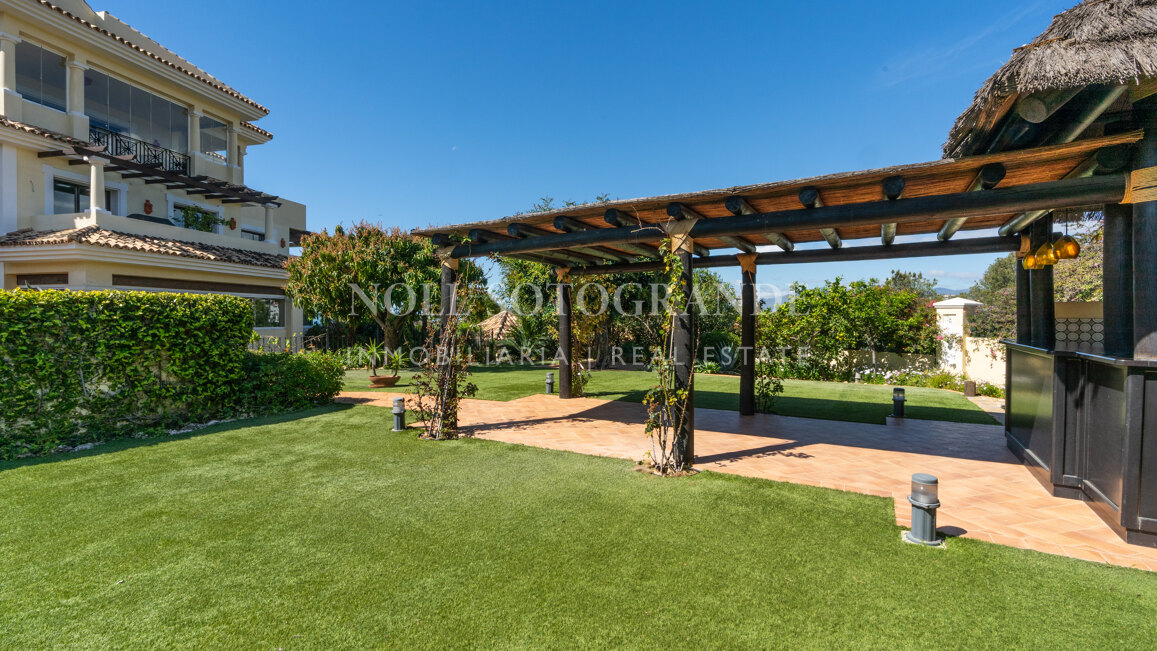 Corner garden apartment with private pool and partial sea views in Aloha Park