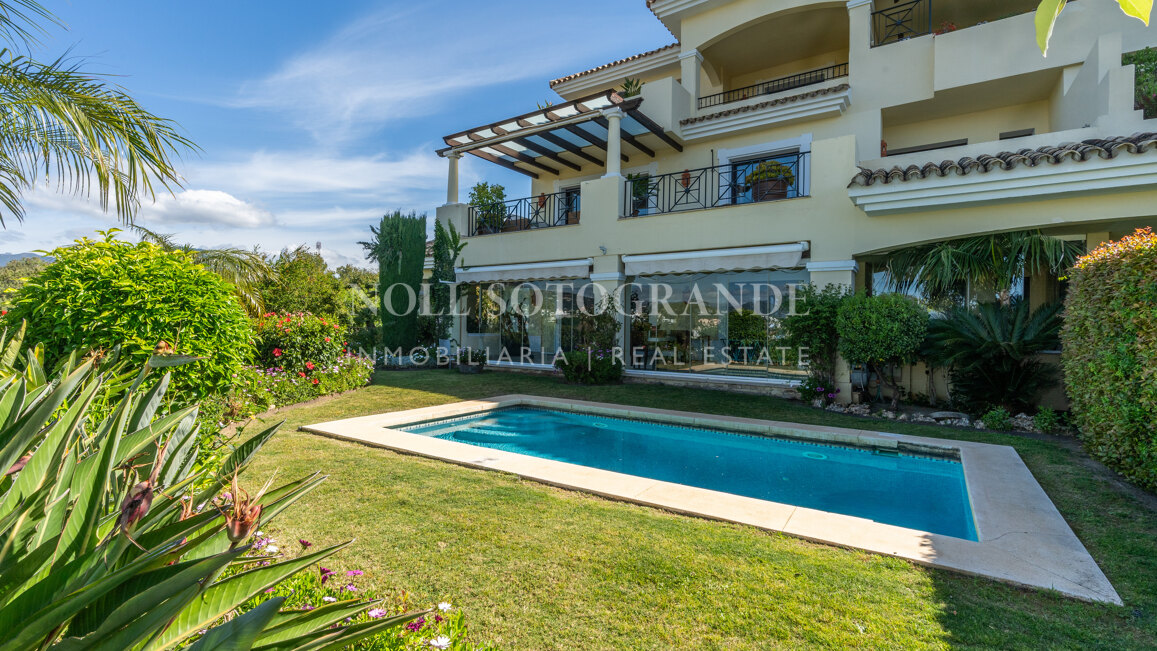 Corner garden apartment with private pool and partial sea views in Aloha Park