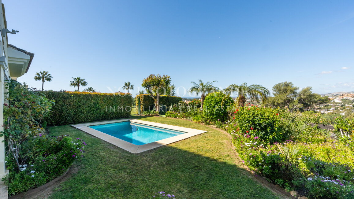 Corner garden apartment with private pool and partial sea views in Aloha Park