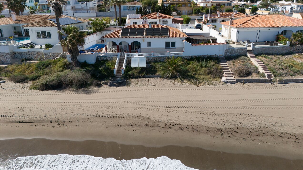 Charming 'on the beach' 4 bedroom villa is perfect renovation project for any clever investor!