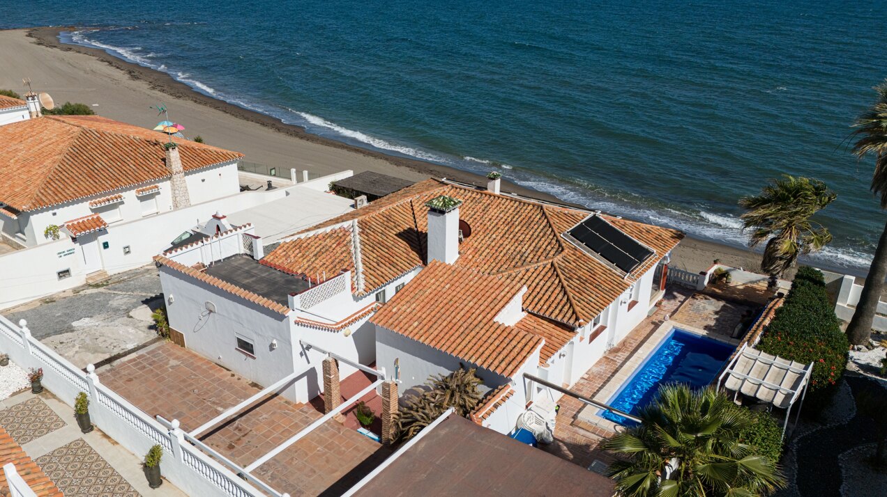 Charming 'on the beach' 4 bedroom villa is perfect renovation project for any clever investor!