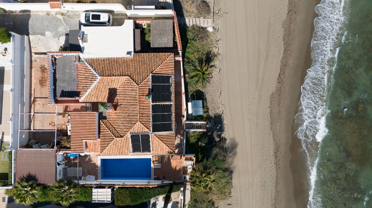 Charming 'on the beach' 4 bedroom villa is perfect renovation project for any clever investor!