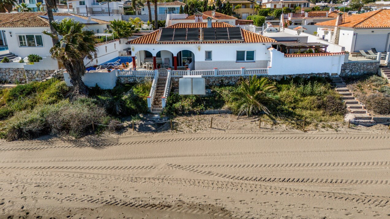 Charming 'on the beach' 4 bedroom villa is perfect renovation project for any clever investor!