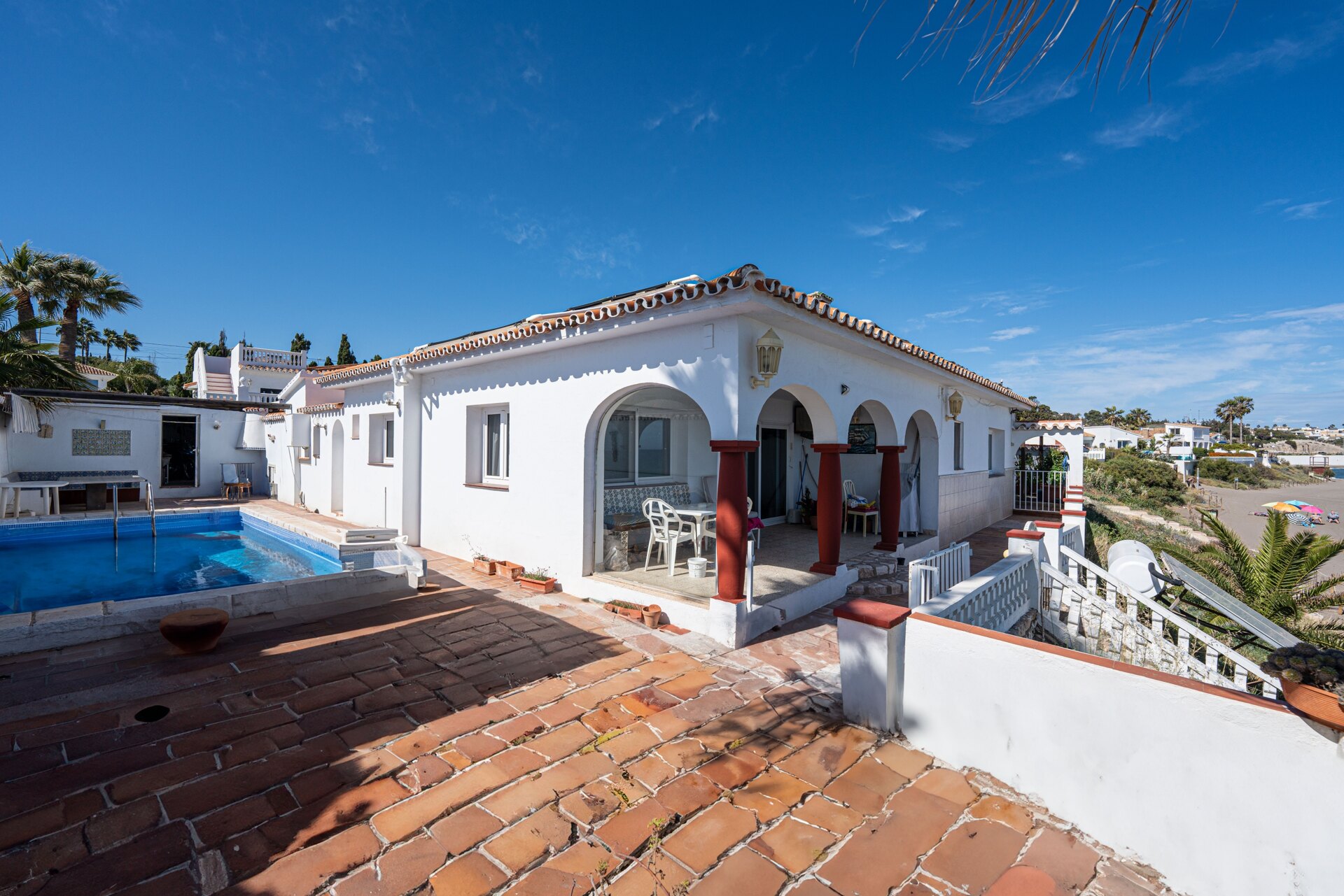 Charming 'on the beach' 4 bedroom villa is perfect renovation project for any clever investor!