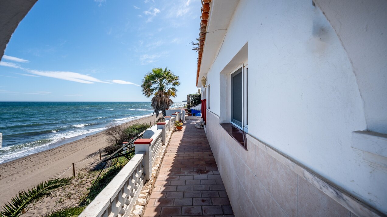 Charming 'on the beach' 4 bedroom villa is perfect renovation project for any clever investor!