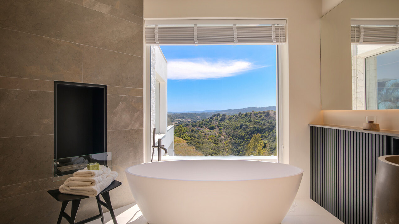 Exquisite modernistic contemporary villa gilds the golf valley in Nueva Andalucia with its effortless elegance