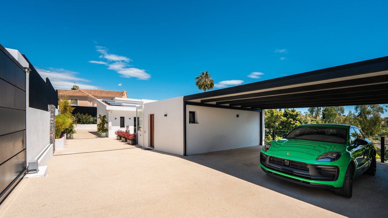 Impressive perfectly renovated villa exhibits exceptional style and charm in sought after El Rosario