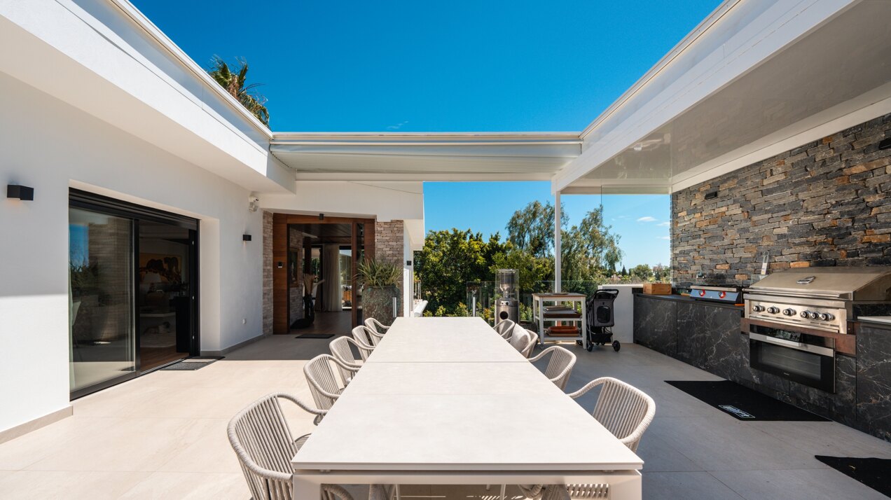 Impressive perfectly renovated villa exhibits exceptional style and charm in sought after El Rosario