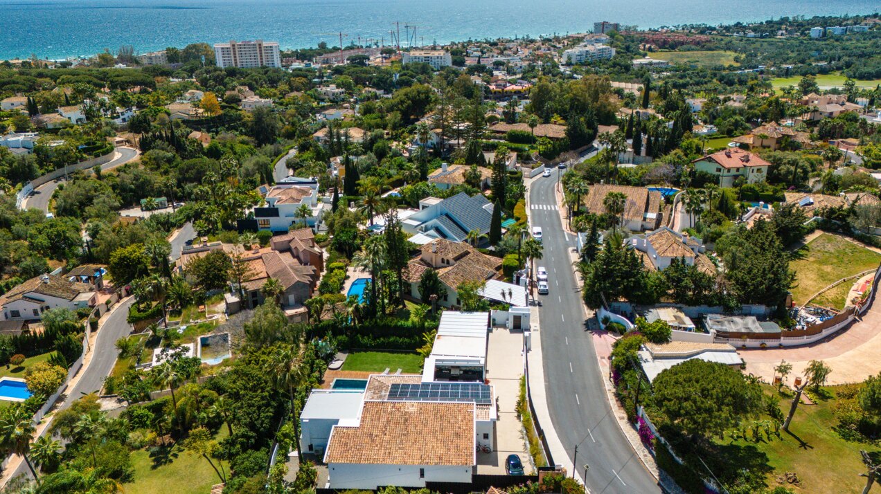 Impressive perfectly renovated villa exhibits exceptional style and charm in sought after El Rosario