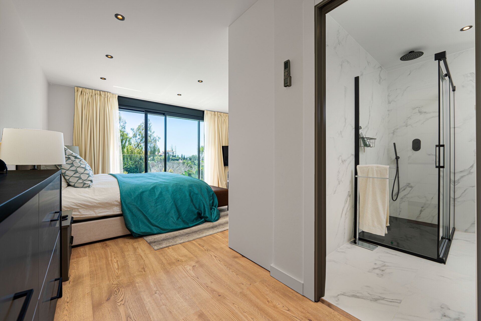 Impressive perfectly renovated villa exhibits exceptional style and charm in sought after El Rosario