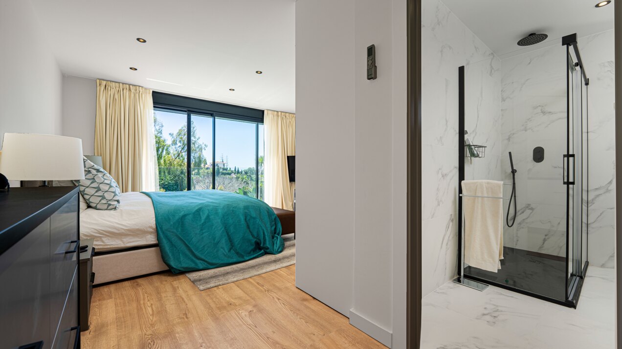 Impressive perfectly renovated villa exhibits exceptional style and charm in sought after El Rosario