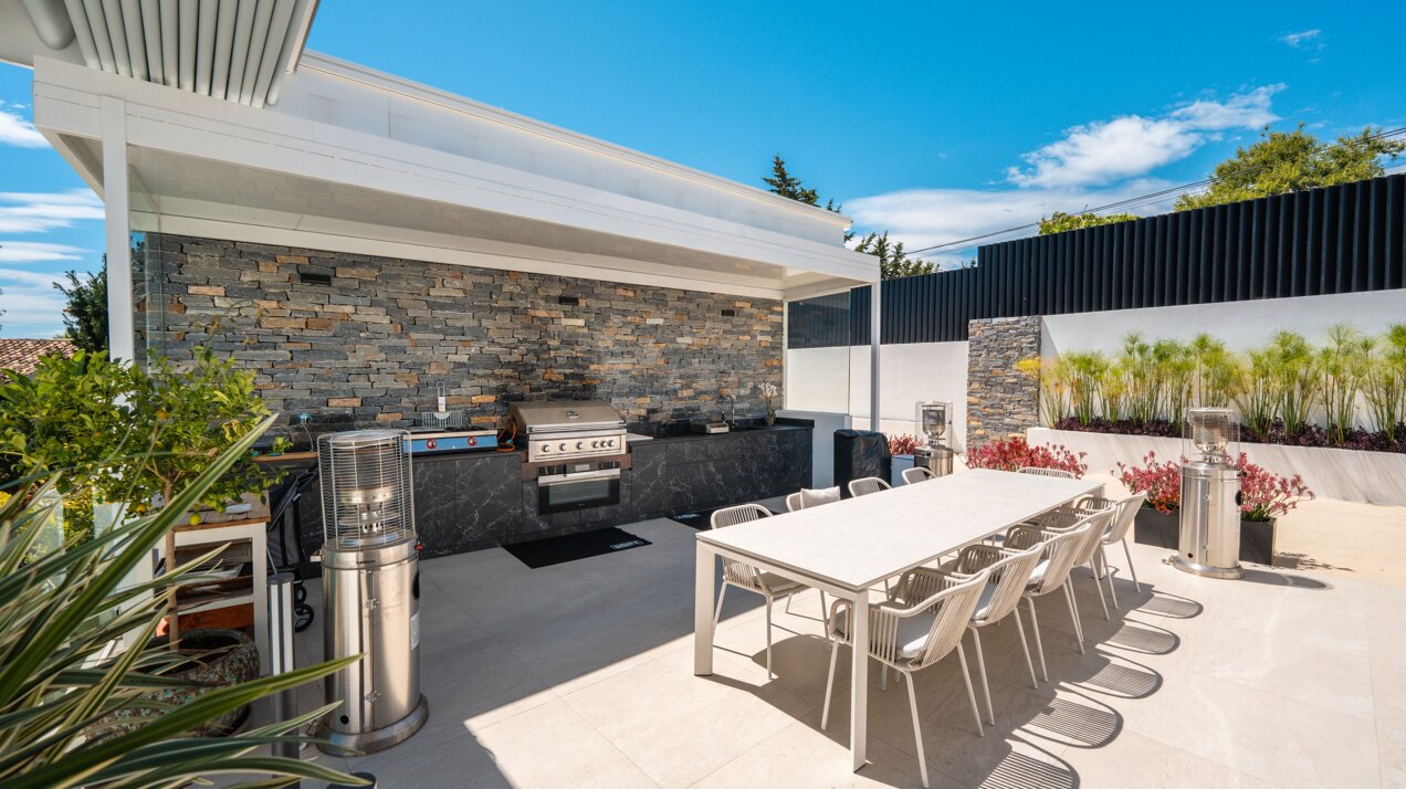 Impressive perfectly renovated villa exhibits exceptional style and charm in sought after El Rosario