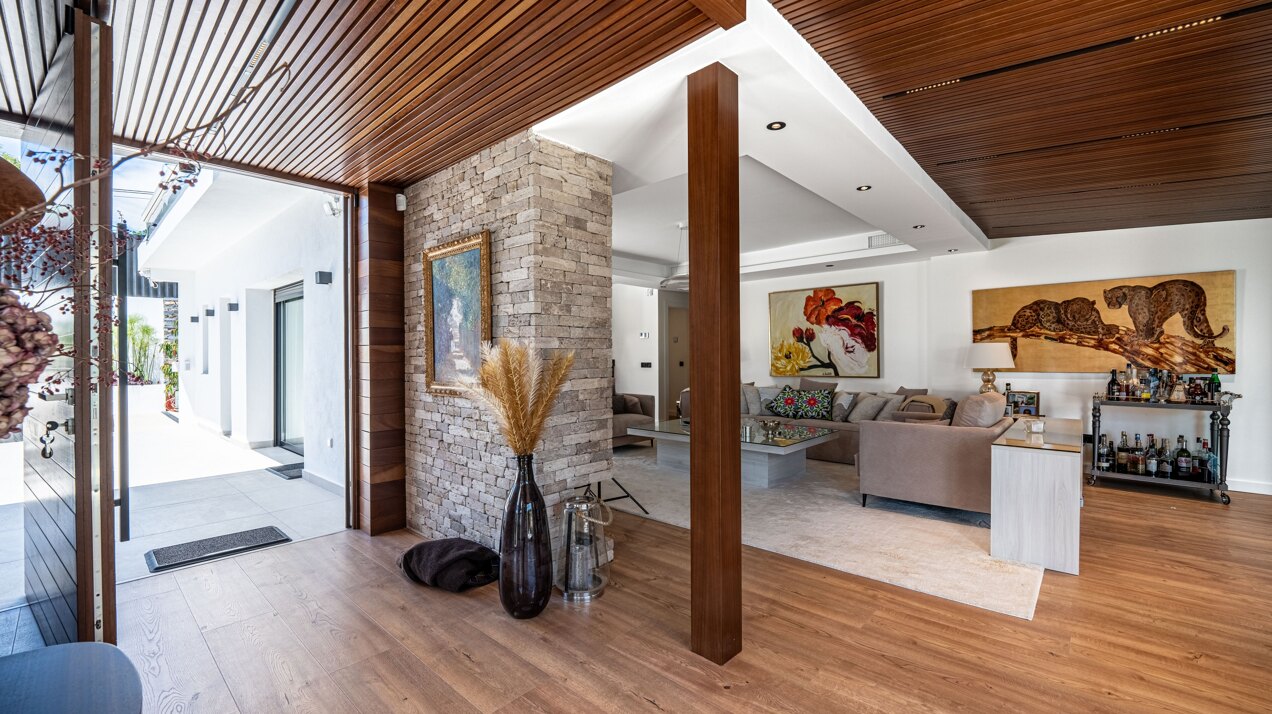 Impressive perfectly renovated villa exhibits exceptional style and charm in sought after El Rosario