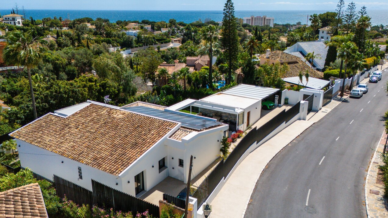 Impressive perfectly renovated villa exhibits exceptional style and charm in sought after El Rosario