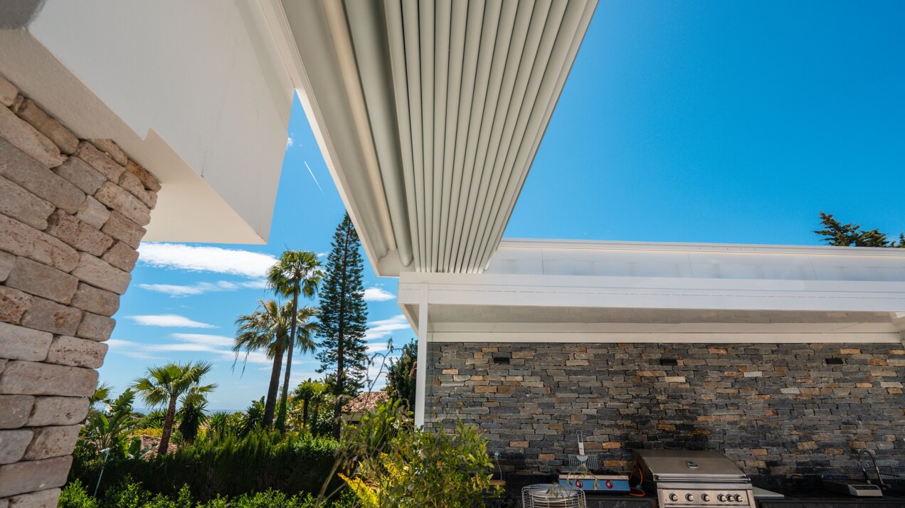 Impressive perfectly renovated villa exhibits exceptional style and charm in sought after El Rosario