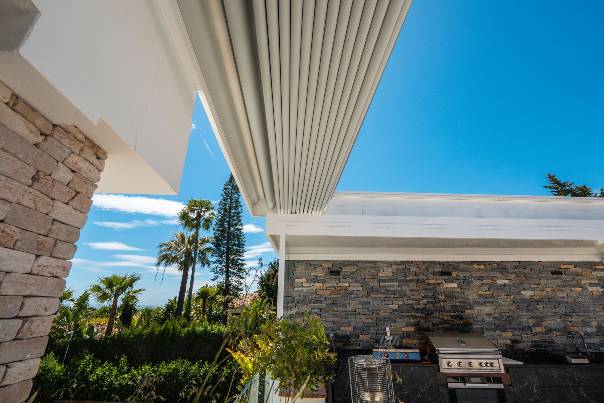 Impressive perfectly renovated villa exhibits exceptional style and charm in sought after El Rosario