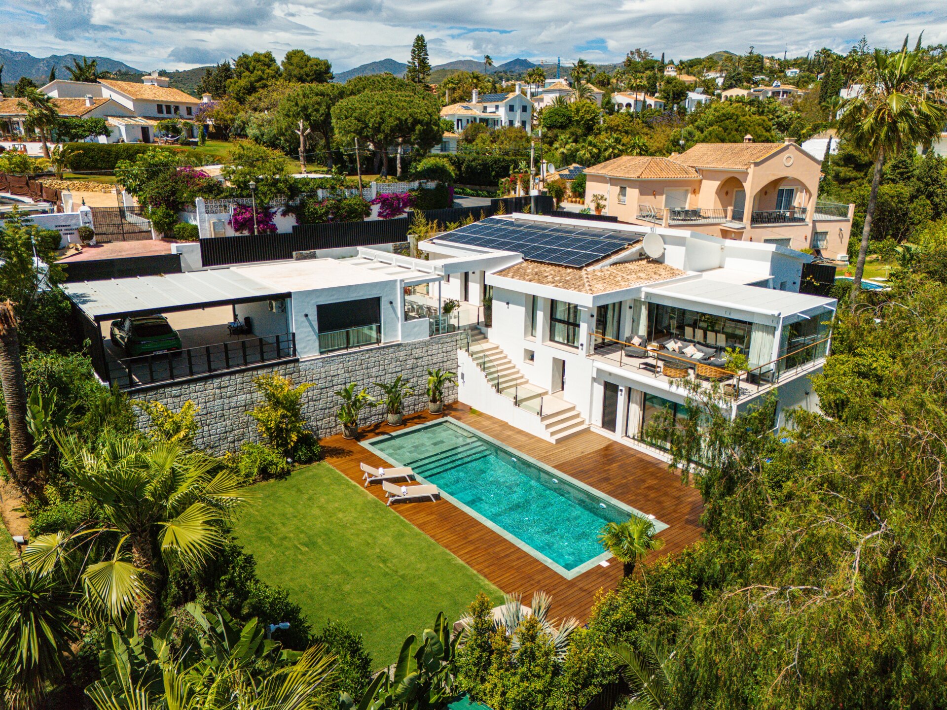 Impressive perfectly renovated villa exhibits exceptional style and charm in sought after El Rosario