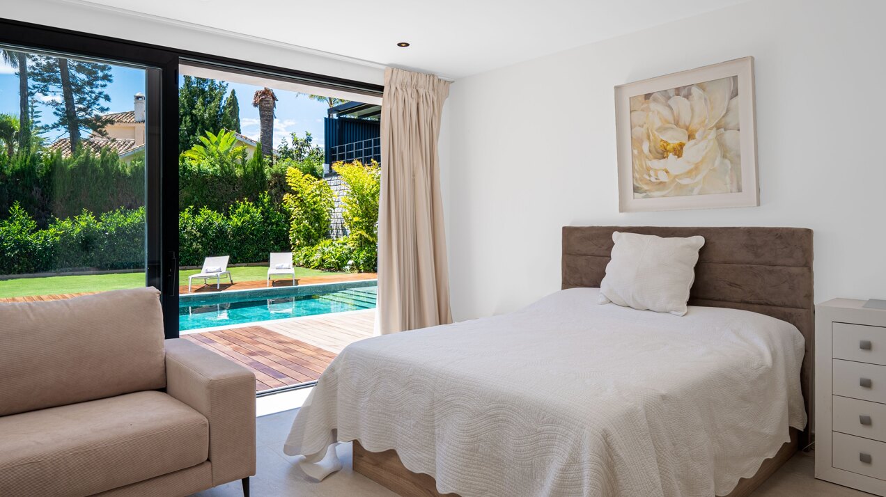 Impressive perfectly renovated villa exhibits exceptional style and charm in sought after El Rosario