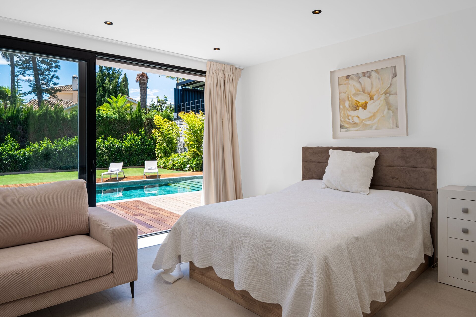Impressive perfectly renovated villa exhibits exceptional style and charm in sought after El Rosario