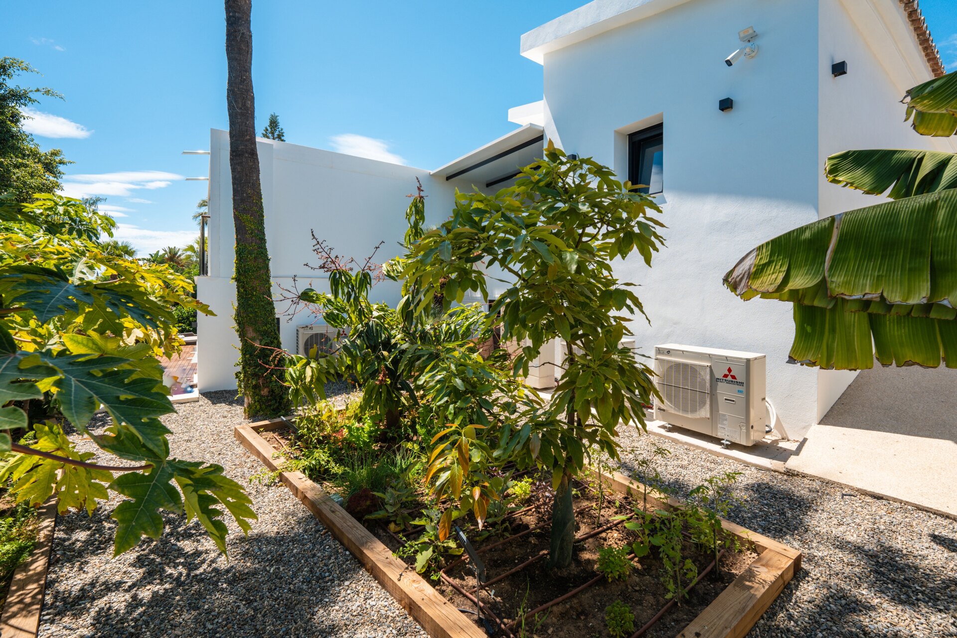 Impressive perfectly renovated villa exhibits exceptional style and charm in sought after El Rosario