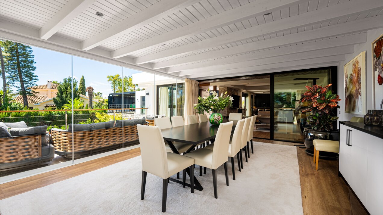 Impressive perfectly renovated villa exhibits exceptional style and charm in sought after El Rosario