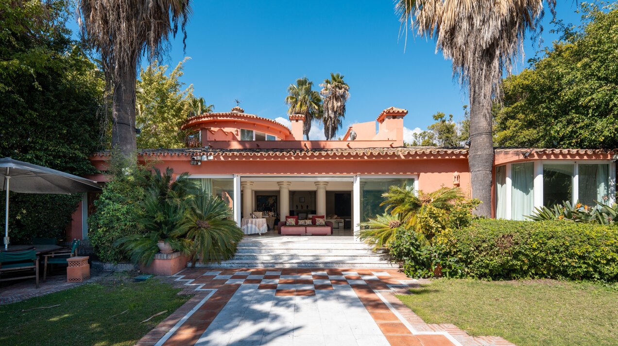 Secluded stately mansion languishes amidst subtropical gardens in the heart of Marbella.