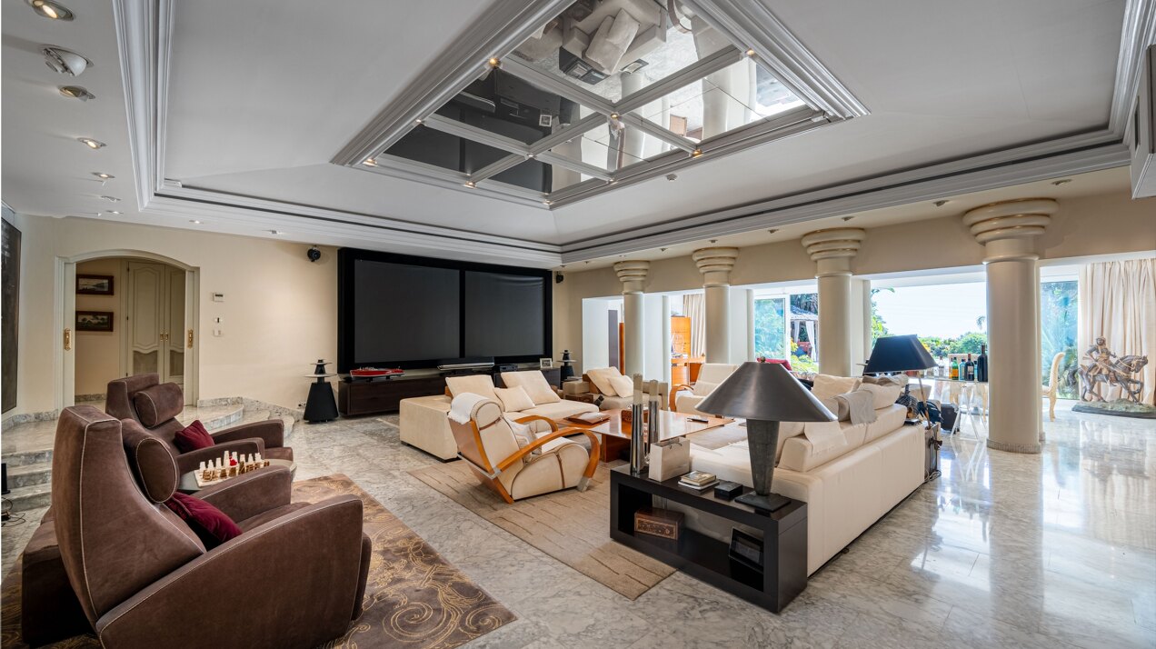 Secluded stately mansion languishes amidst subtropical gardens in the heart of Marbella.