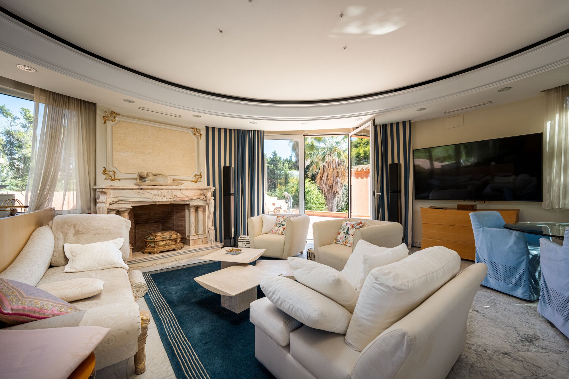 Secluded stately mansion languishes amidst subtropical gardens in the heart of Marbella.