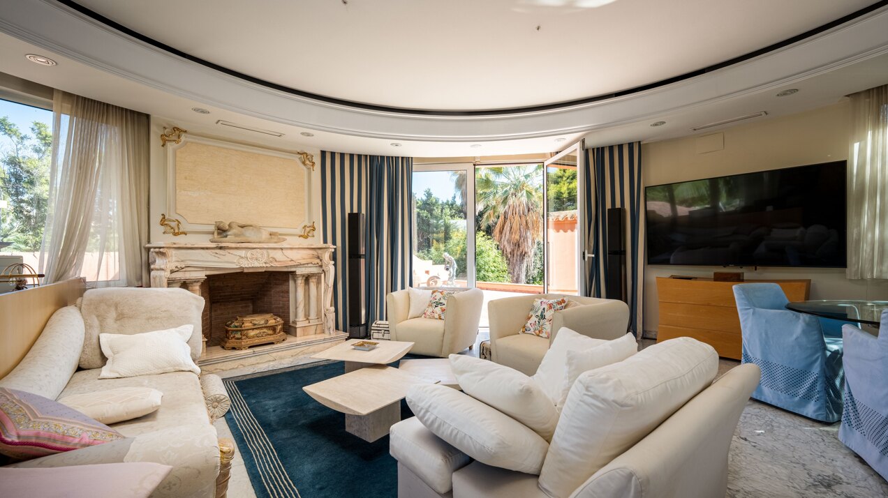 Secluded stately mansion languishes amidst subtropical gardens in the heart of Marbella.