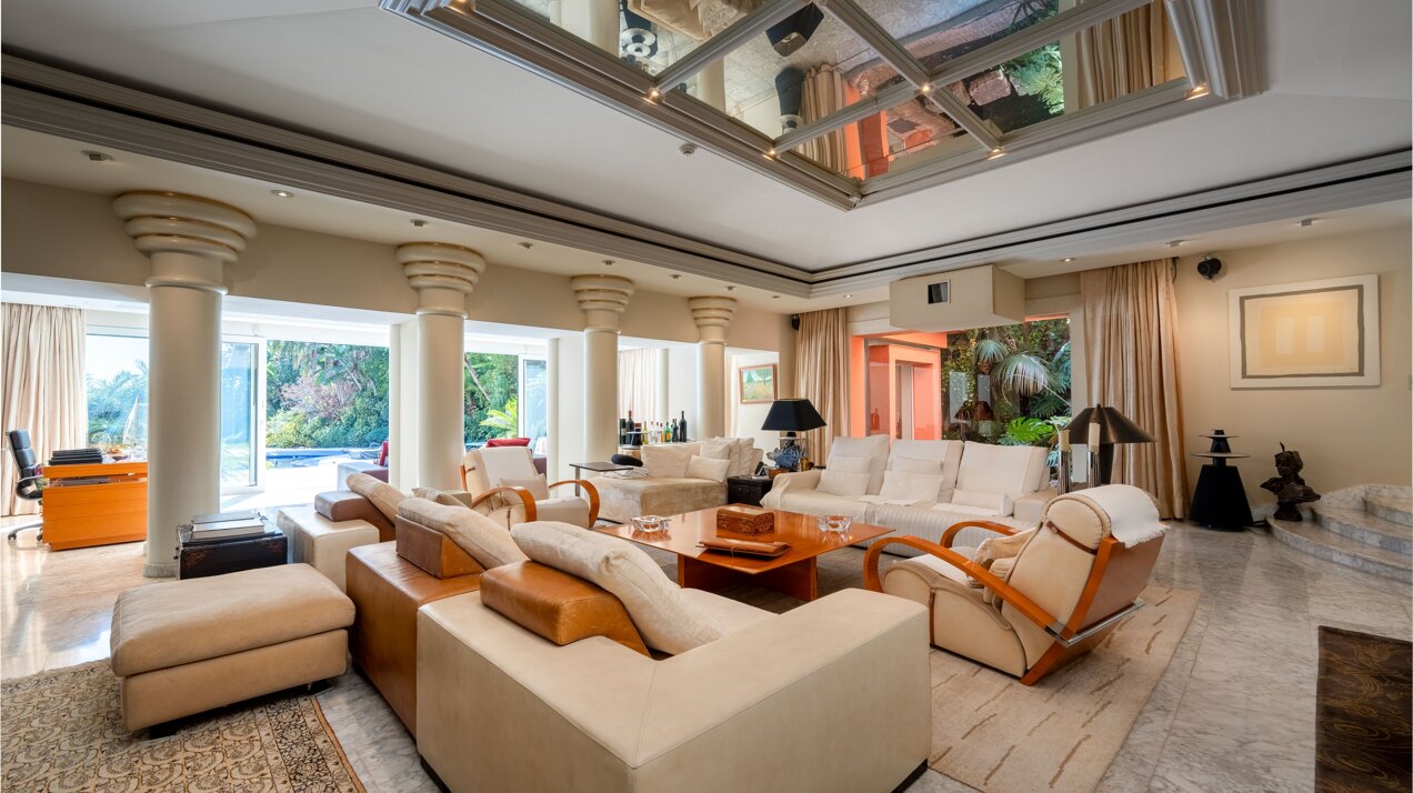 Secluded stately mansion languishes amidst subtropical gardens in the heart of Marbella.