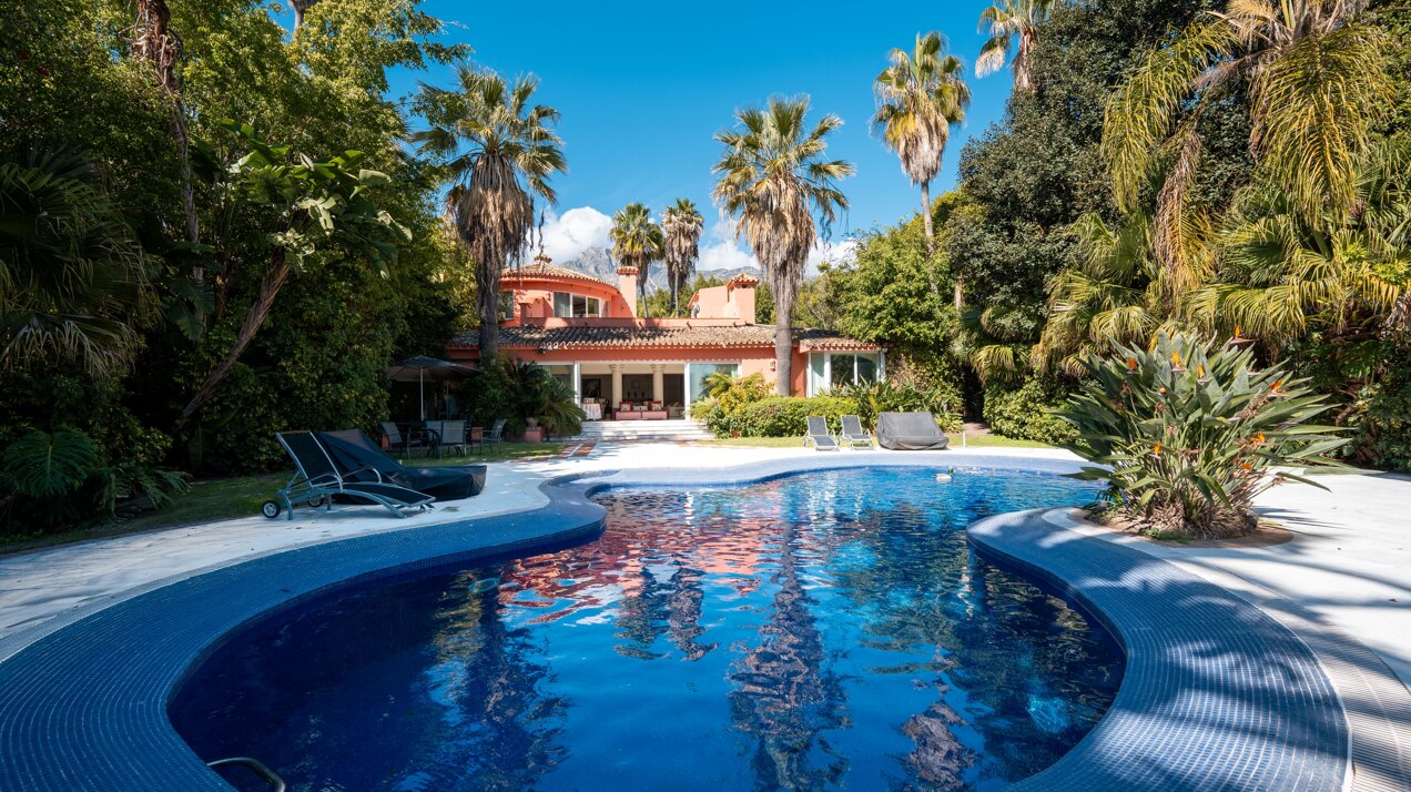 Secluded stately mansion languishes amidst subtropical gardens in the heart of Marbella.
