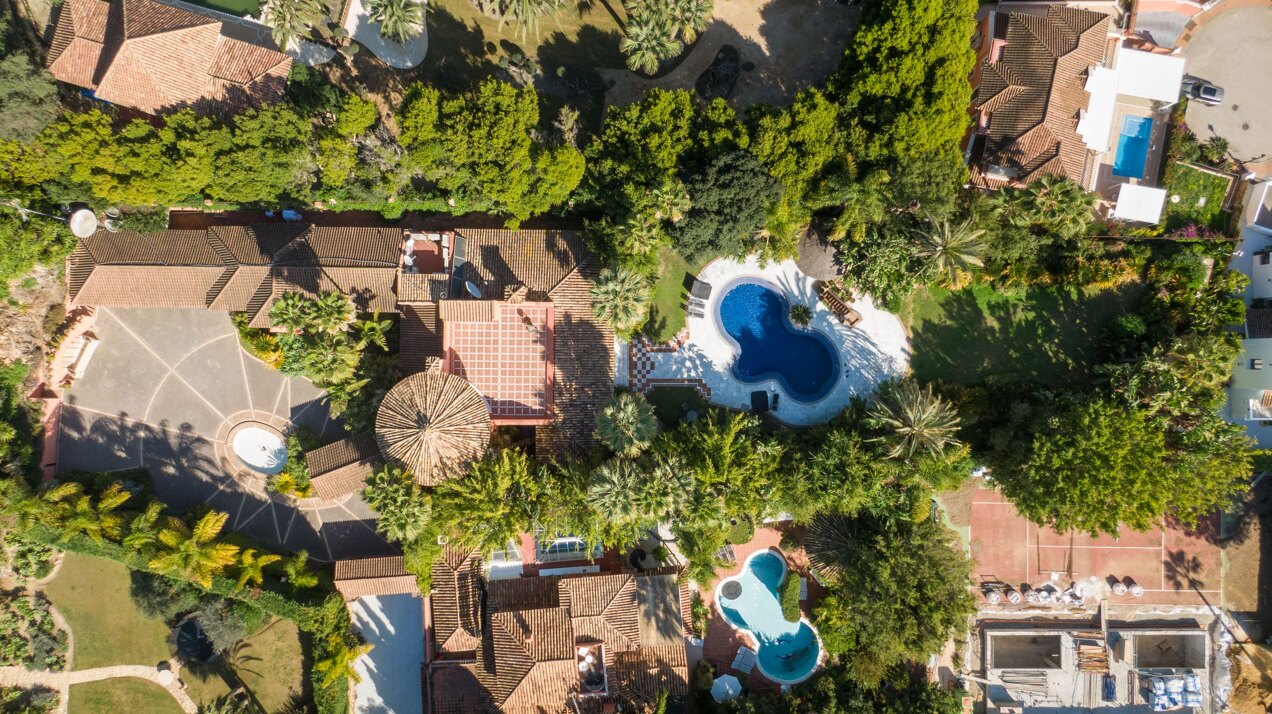 Secluded stately mansion languishes amidst subtropical gardens in the heart of Marbella.