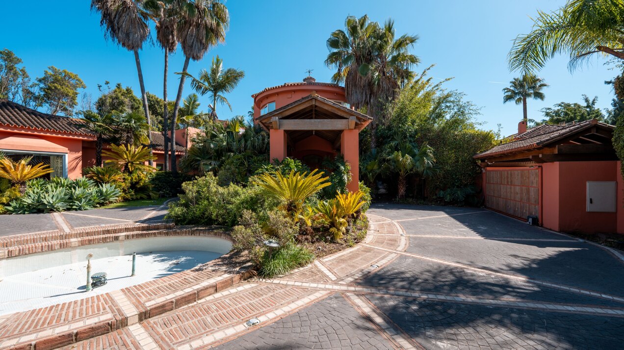 Secluded stately mansion languishes amidst subtropical gardens in the heart of Marbella.