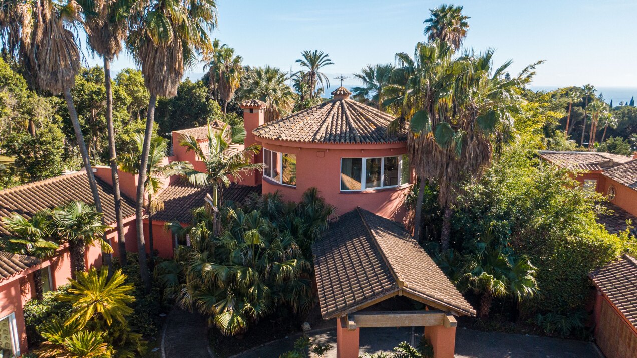 Secluded stately mansion languishes amidst subtropical gardens in the heart of Marbella.