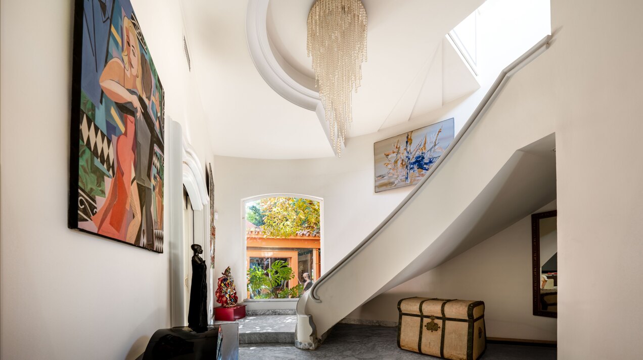 Secluded stately mansion languishes amidst subtropical gardens in the heart of Marbella.