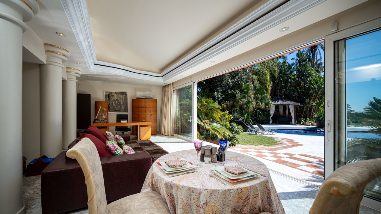 Secluded stately mansion languishes amidst subtropical gardens in the heart of Marbella.