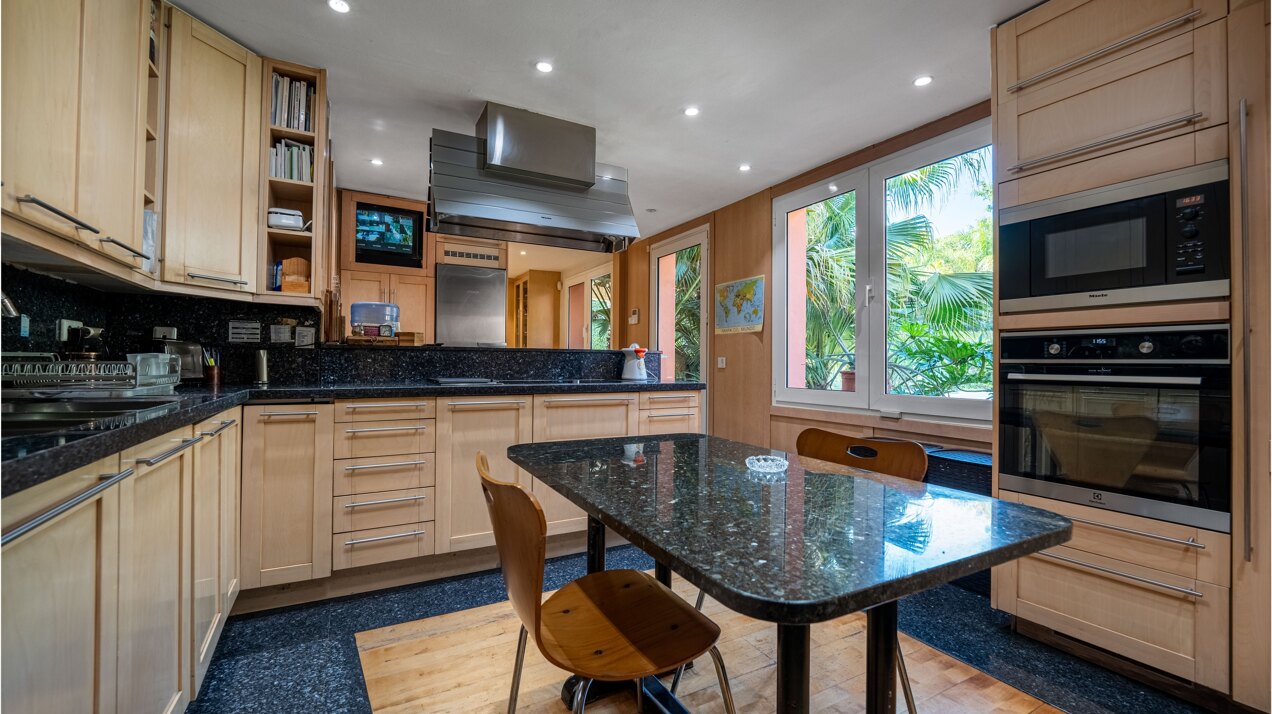 Secluded stately mansion languishes amidst subtropical gardens in the heart of Marbella.