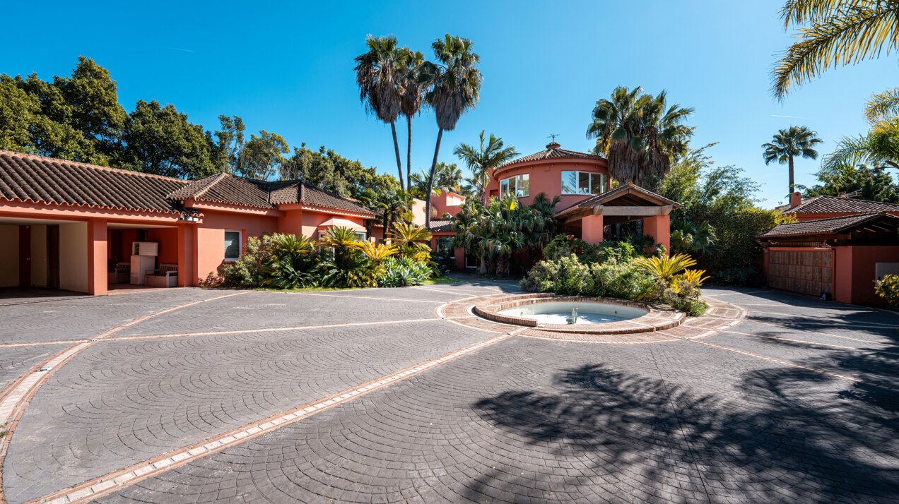 Secluded stately mansion languishes amidst subtropical gardens in the heart of Marbella.
