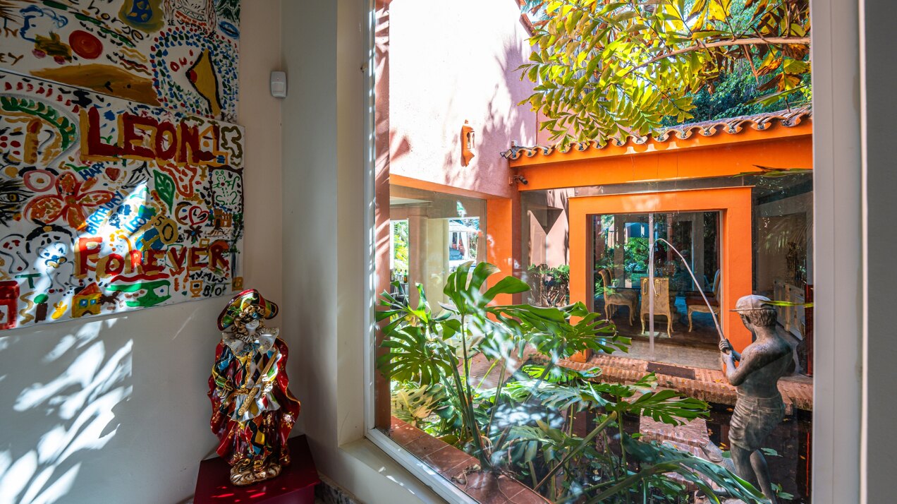 Secluded stately mansion languishes amidst subtropical gardens in the heart of Marbella.