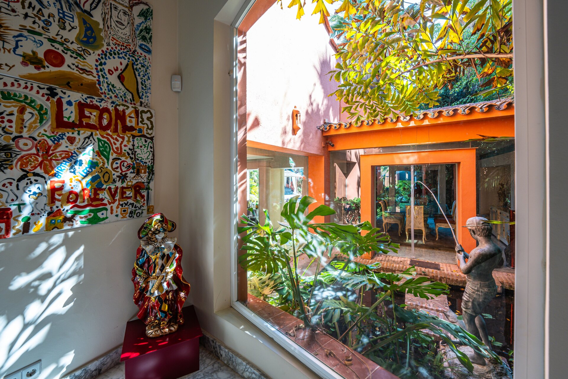 Secluded stately mansion languishes amidst subtropical gardens in the heart of Marbella.