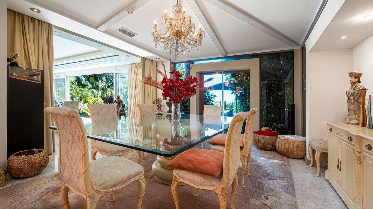 Secluded stately mansion languishes amidst subtropical gardens in the heart of Marbella.