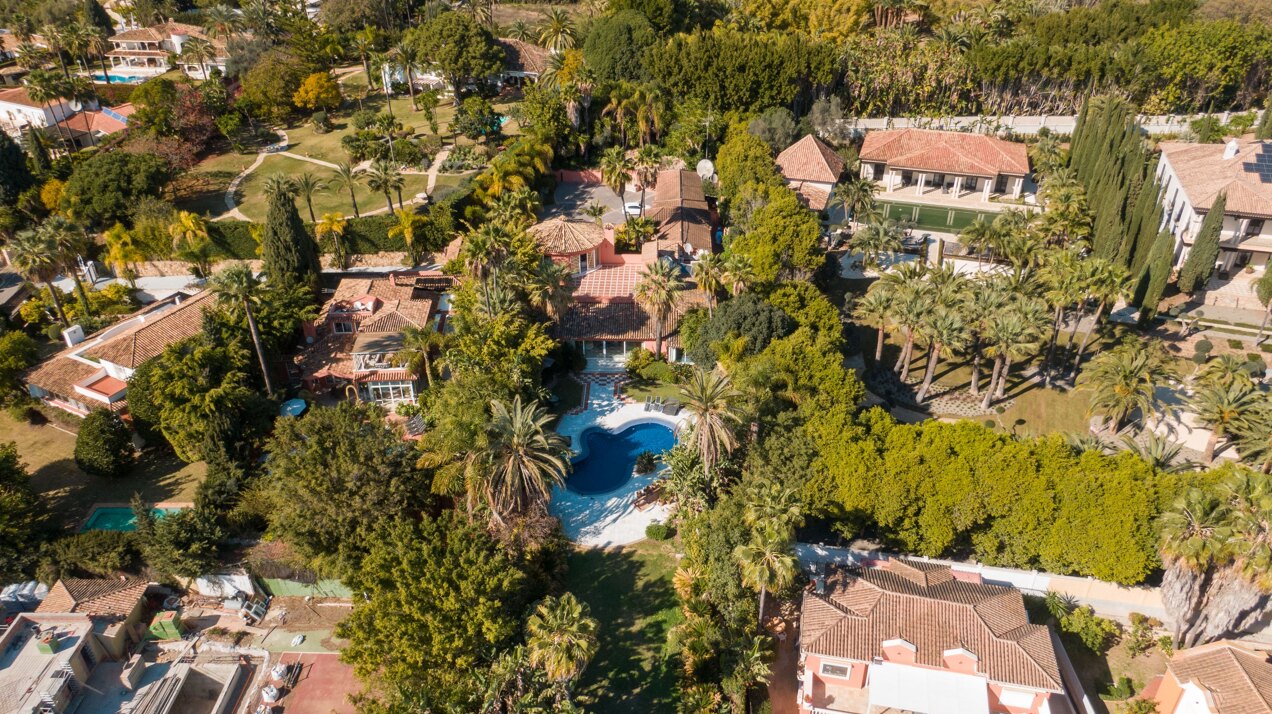 Secluded stately mansion languishes amidst subtropical gardens in the heart of Marbella.