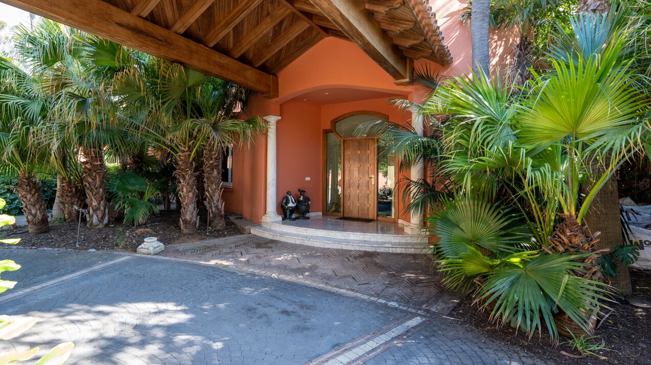 Secluded stately mansion languishes amidst subtropical gardens in the heart of Marbella.