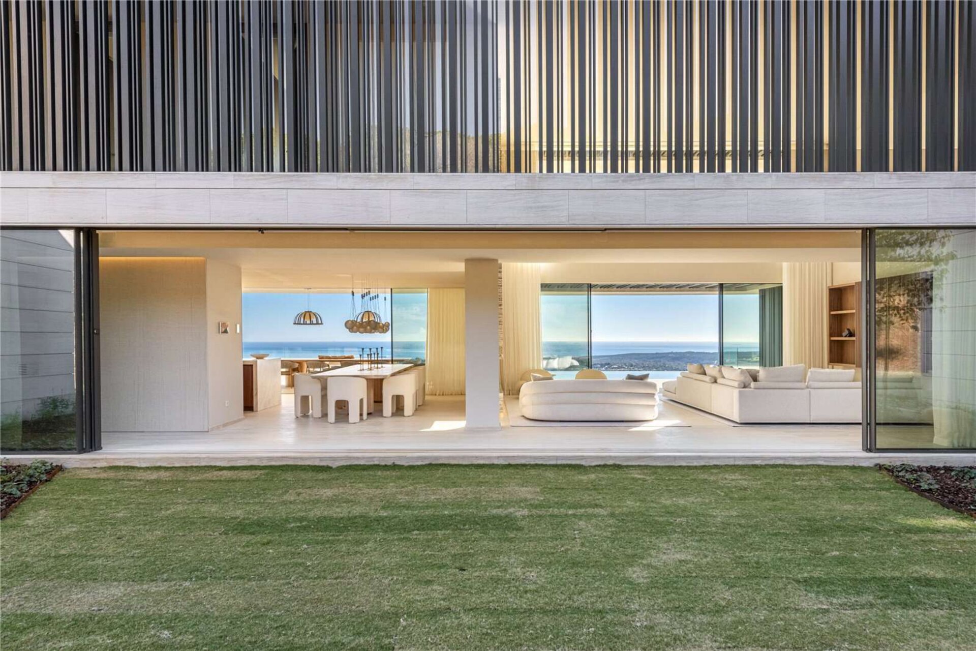 Ultra chic and modern residence flaunts 180º unparalleled views along southern Spanish coastline
