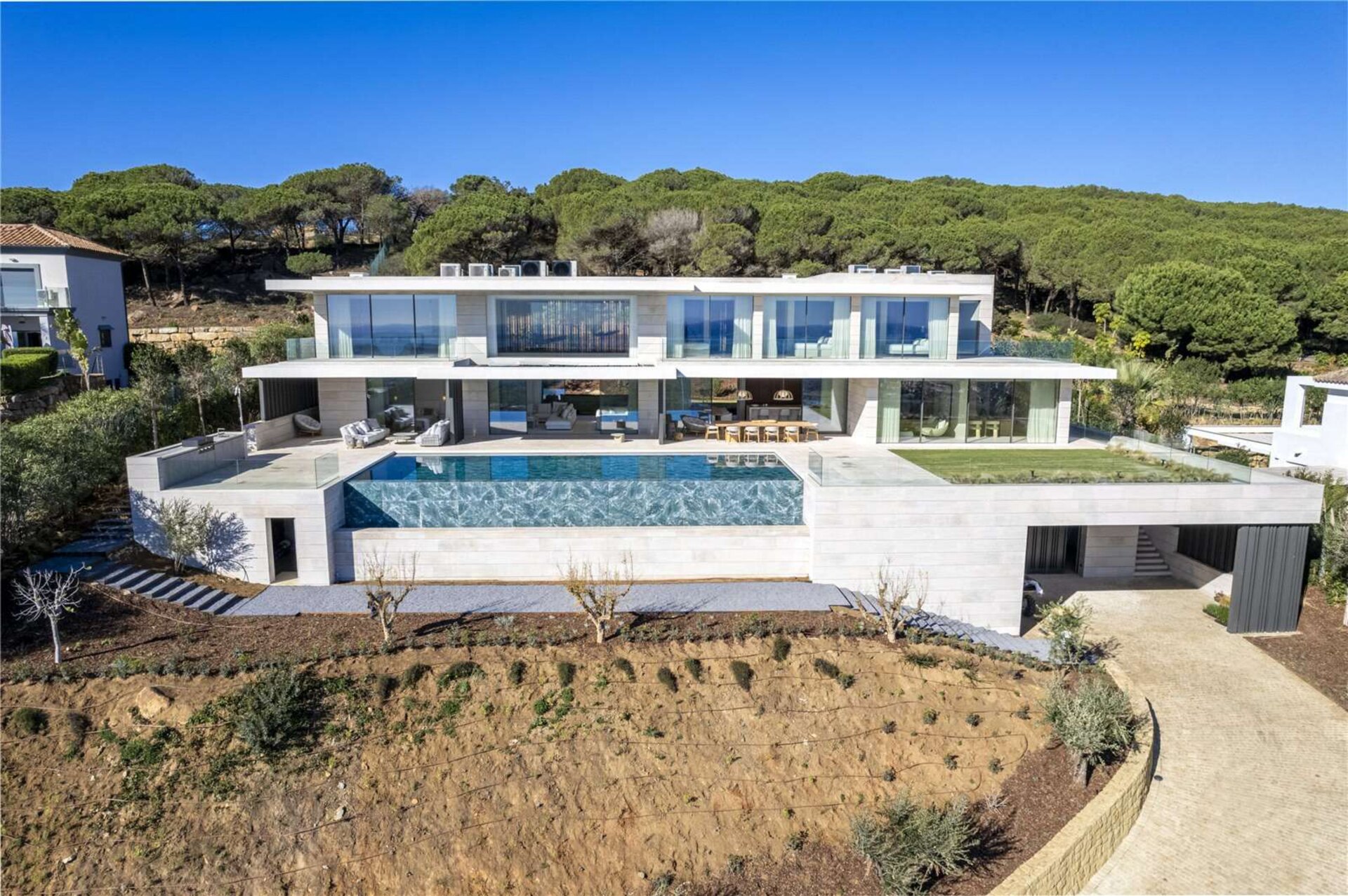 Ultra chic and modern residence flaunts 180º unparalleled views along southern Spanish coastline